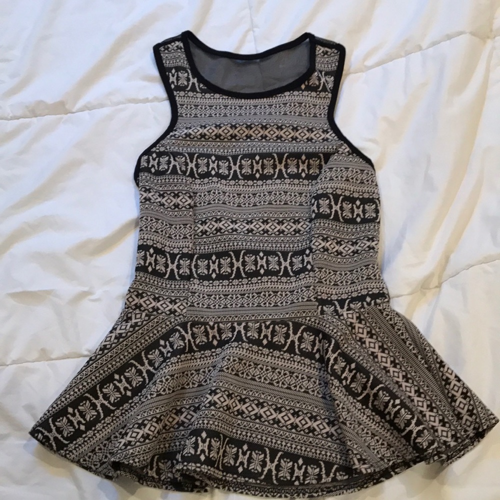 Tribal print peplum top with sheer back